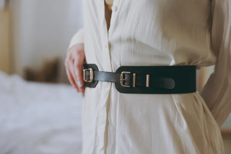 close up woman white shirt black leather belt | MercerOnline
