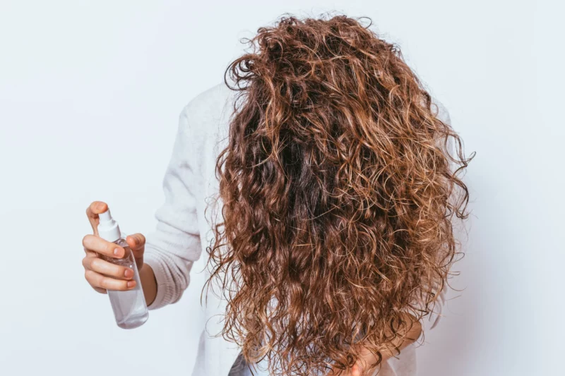 curly haired woman sea salt spray | MercerOnline