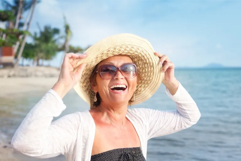 Woman wearing beach hat | MercerOnline